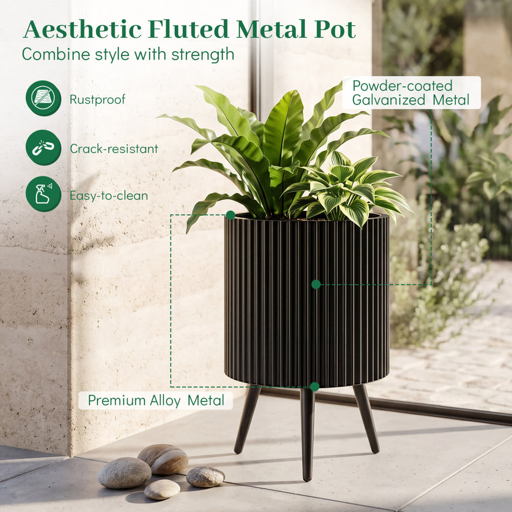 Aesthetic 14-inch fluted metal plant pot with tapered legs, rustproof and easy-to-clean for indoor and outdoor use.