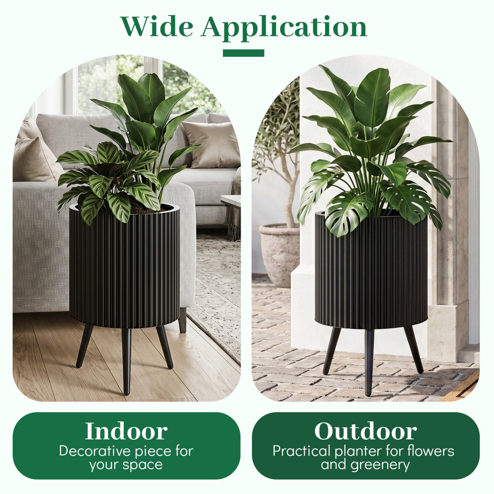 Aesthetic 14-inch fluted metal plant pot with tapered legs, ideal for indoor and outdoor use for flowers and greenery.