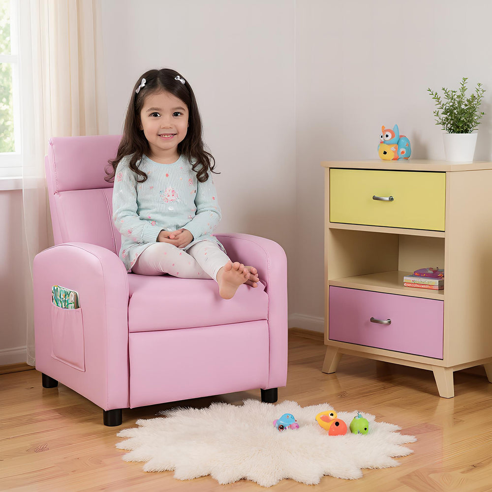 Pink ergonomic PU leather kids recliner lounge sofa with adjustable backrest, perfect for ages 3-12, in a cozy playroom.
