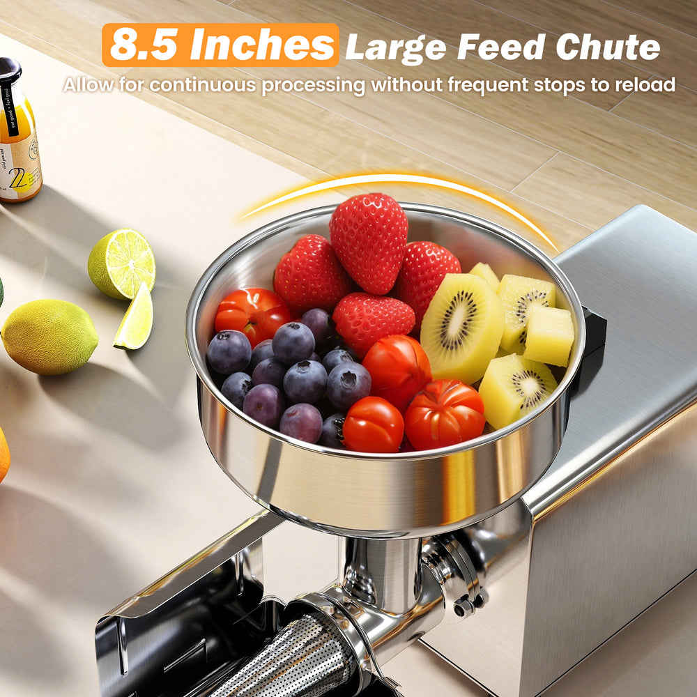 Large 8.5-inch feed chute filled with fresh fruits for the 450W stainless steel tomato strainer, ideal for jam making.