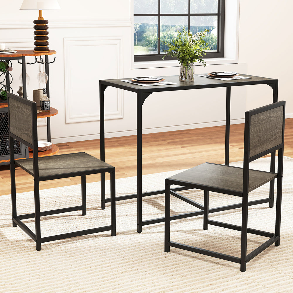 Compact 3-piece dining set with oak finish, featuring a table and 2 chairs, ideal for small spaces.