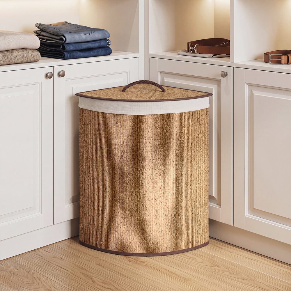 Bamboo laundry hamper with removable liner, 15-gal capacity, foldable design for easy storage in any room.