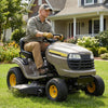 Riding mower with 15 x 6.00-6 tubeless tires, featuring heavy-duty 4-ply rubber for demanding mowing tasks.