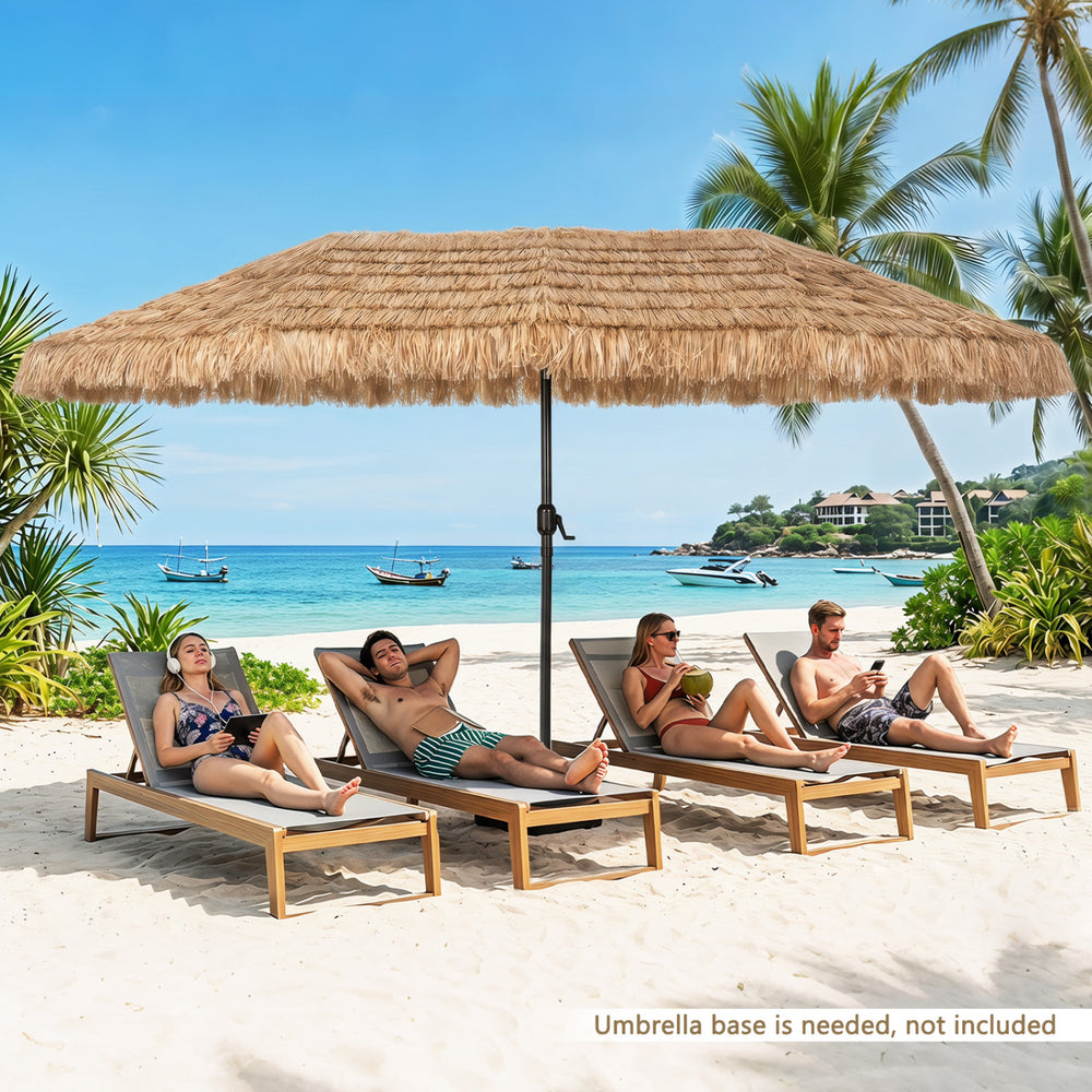 Oversized 15 x 9 FT solar double-sided patio umbrella with thatched design and multi-colored lights for garden or poolside use.