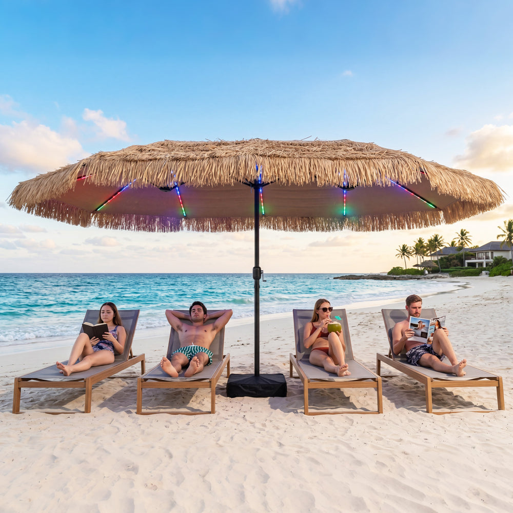 The 15 x 9 FT solar double-sided patio umbrella features 144 multi-colored lights, perfect for beachside gatherings.