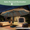 15 x 9 FT solar double-sided patio umbrella with 144 multi-colored lights, perfect for backyard gatherings and poolside lounging.