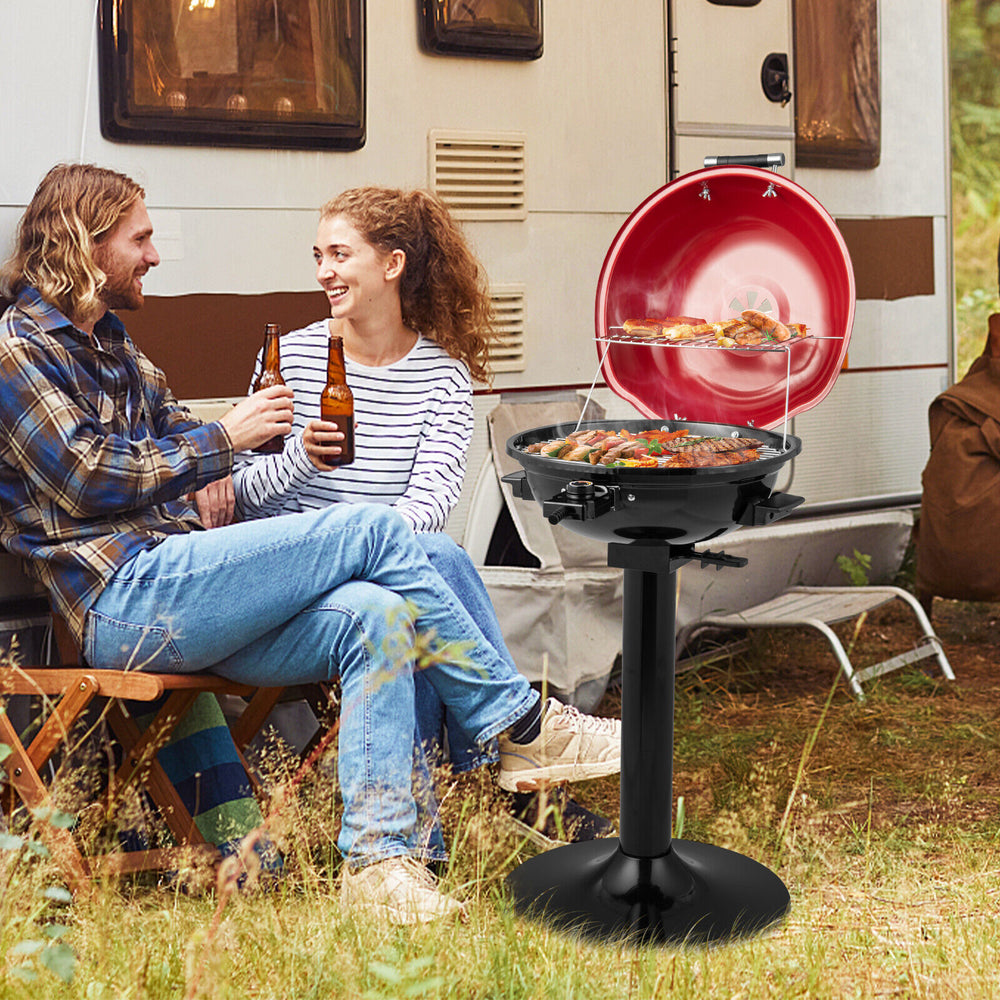 Electric BBQ grill in red with removable warming rack, perfect for outdoor cooking and family gatherings.