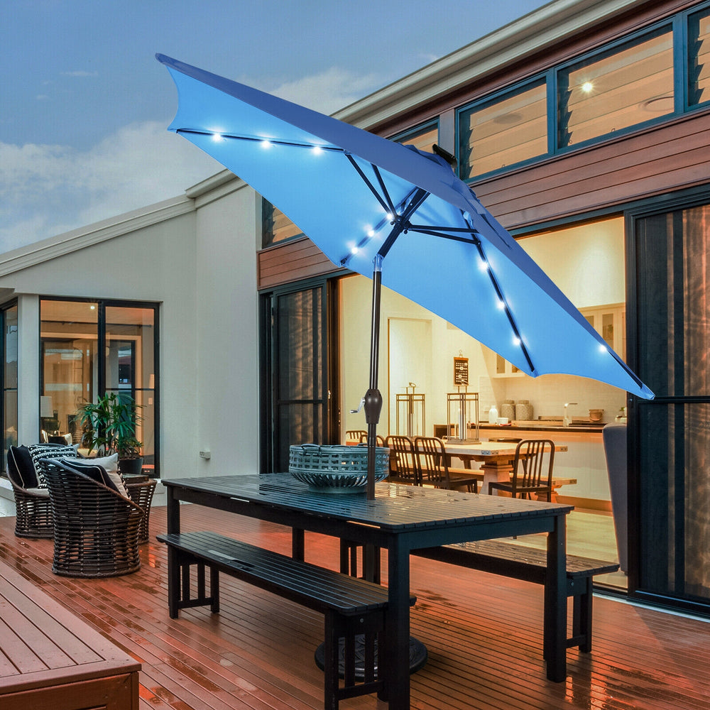 Blue 9-foot solar LED lighted patio umbrella with tilt adjustment, crank lift, and vented canopy for outdoor use.