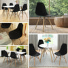Black Mid-Century Modern DSW dining side chair with wood legs, perfect for stylish dining room decor.