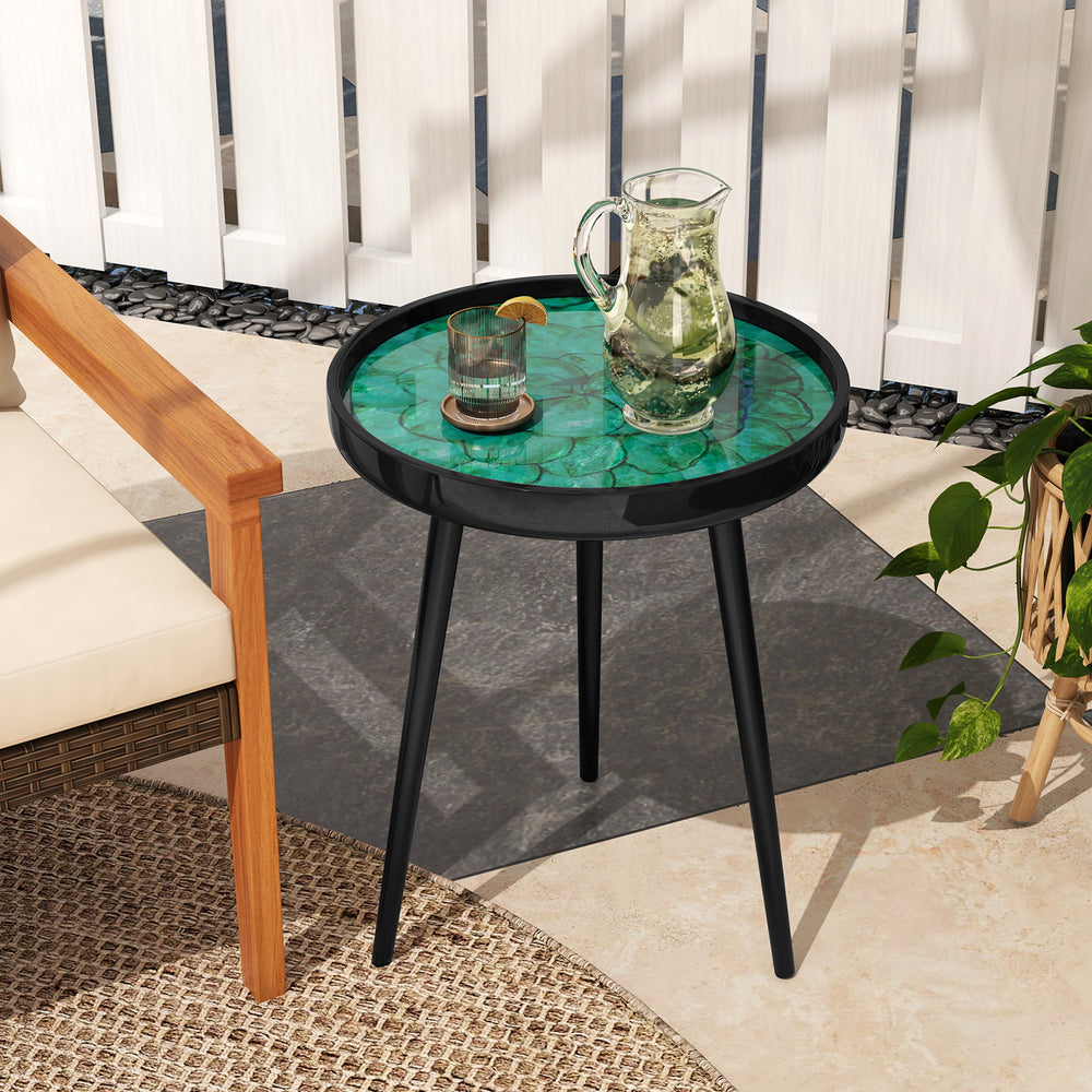 Mid-century modern coffee end table showcasing a green sea shell tabletop with a deep edge, ideal for decorative items.