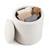 Round beige storage ottoman with a reversible lid, perfect for organizing items and serving as a footrest or coffee table.