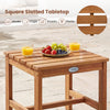 Square acacia wood side table with slatted tabletop, ideal for outdoor use in backyard or patio settings.