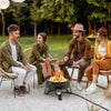 Portable 17-inch gas fire pit with folding legs and removable grill, perfect for camping and outdoor gatherings.