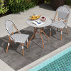 3-piece French bistro set featuring a round wicker table and two dining chairs, perfect for outdoor leisure by the pool.