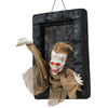 Hanging animated zombie prisoner decoration with glowing red eyes and sound activation for a spooky Halloween.