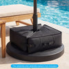 Square umbrella base weight in black, made of weatherproof fabric, designed for stability at poolside or patio.