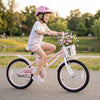 Kids bike with adjustable seat and front basket in pink, featuring training wheels for beginners and a sturdy kickstand.