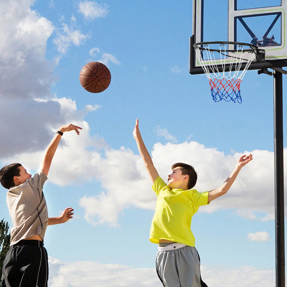 18-inch basketball rim with all-weather net, shown in action outdoors, perfect for versatile indoor and outdoor play.