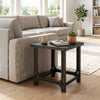 Black 18-inch outdoor Adirondack side table features a slatted surface and sturdy frame, ideal for poolside use.