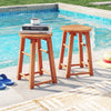 Set of 2 18-inch outdoor wood bar stools with round seats, perfect for poolside or patio use.