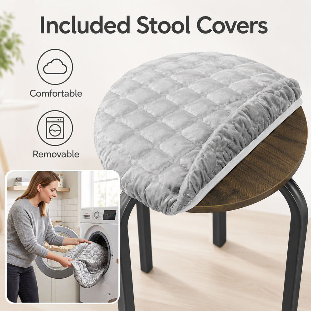 Round stackable stool with a removable, machine-washable gray cover, perfect for kitchen or dining room use.
