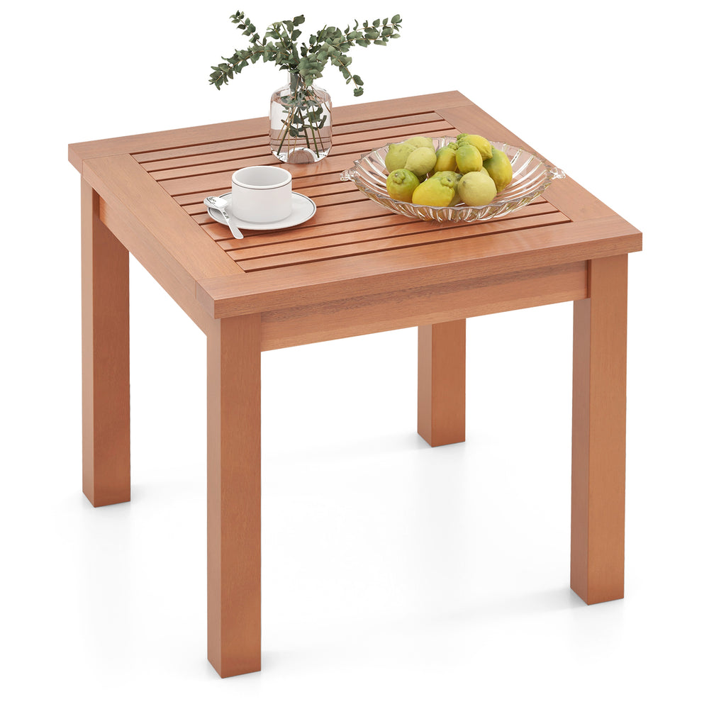 Square 18-inch outdoor side table in natural eucalyptus wood with a slatted top, perfect for serving snacks and drinks.