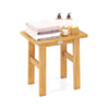Teak shower bench with solid construction, water resistance, and compact design, perfect for shaving legs or as a side.