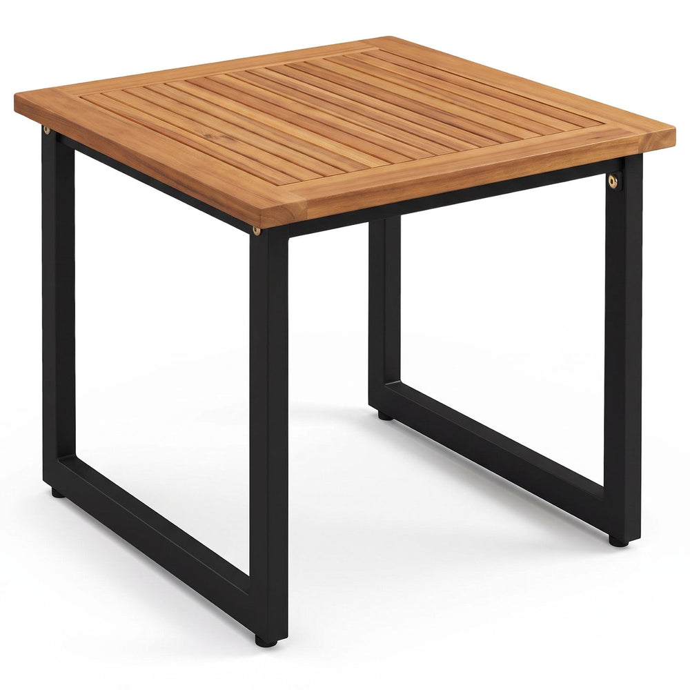 Square acacia wood patio side table with a slatted top and sturdy metal frame, perfect for holding snacks and drinks outdoors.