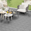 Gray interlocking deck tiles arranged on a patio, featuring a textured surface for slip resistance and weather.