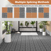 Gray interlocking deck tiles in a slatted design, perfect for outdoor patios and decks, showcasing multiple splicing.