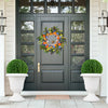 Vintage 18-inch tall white planters with pedestal base, perfect for indoor and outdoor plant displays.