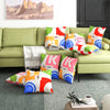 Colorful 18 x 18 inch square throw pillows with removable velvet cases, perfect for adding comfort to your couch.