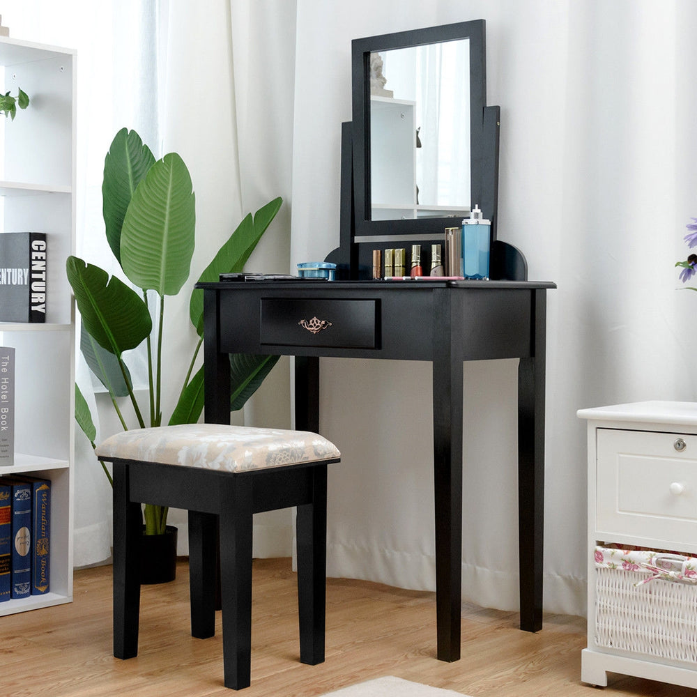 Vanity dressing table set in black with large square mirror and comfortable stool, perfect for makeup and organization.
