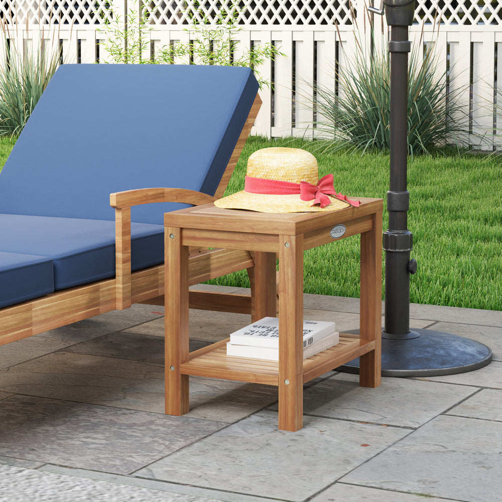 Teak wood shower bench with slatted design, featuring a storage shelf, ideal for poolside or bathroom use.