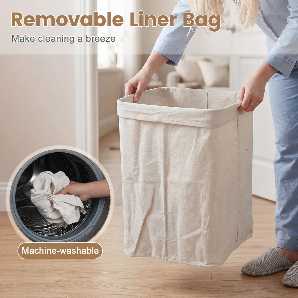 Bamboo clothes hamper with removable liner, portable handles, and natural texture for easy laundry organization.