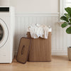 Bamboo clothes hamper with removable liner and portable handles, featuring a 19-gal capacity for laundry organization.