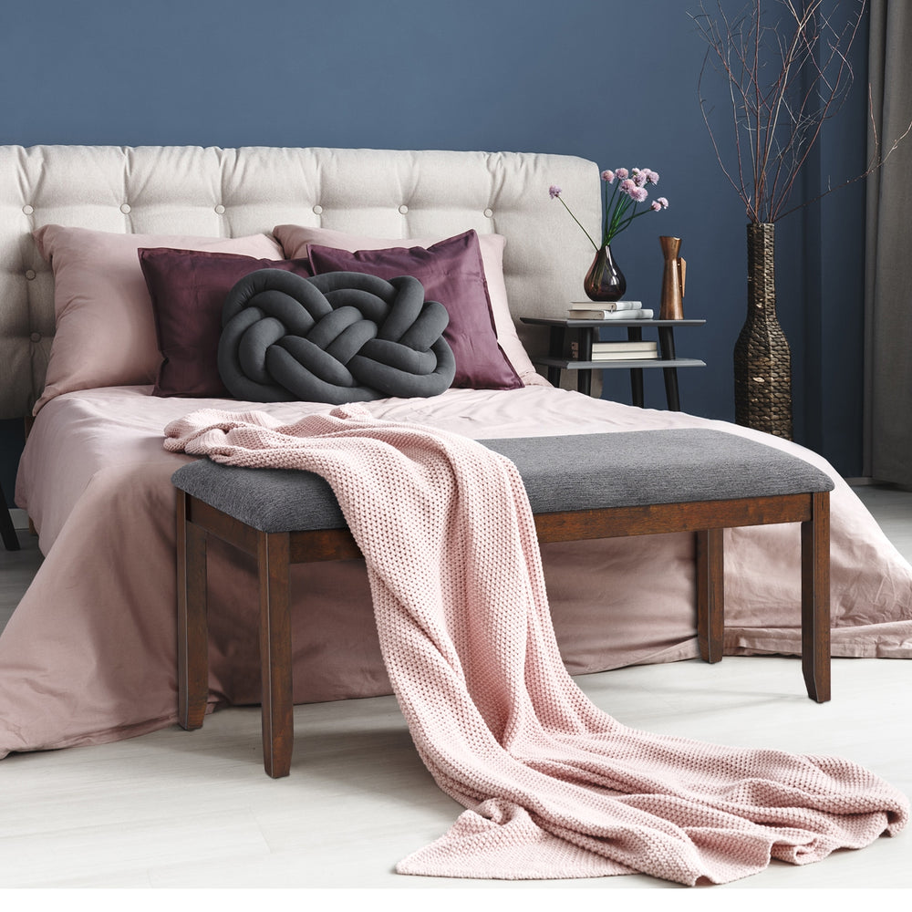 Upholstered entryway bench footstool with wood legs, featuring linen fabric and thick foam for comfortable support.