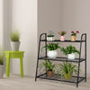 3-tier metal plant stand shelf with a sturdy frame, ideal for displaying plants and decorations in any room.
