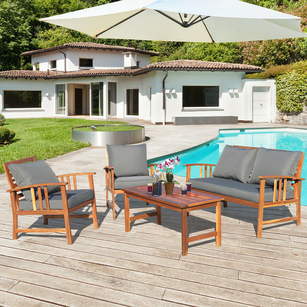 Wooden patio furniture set with cushioned loveseat and chairs, perfect for outdoor relaxation by the pool.