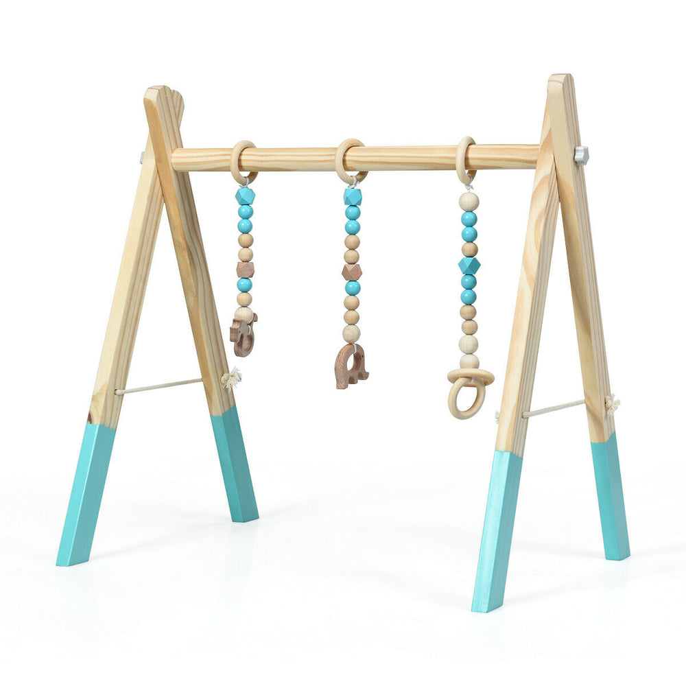 Wooden newborn baby activity gym in blue, featuring hanging teething toys for physical and mental development.