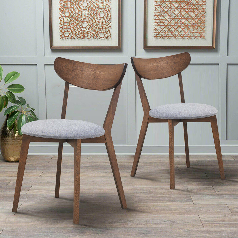 Set of 2 dining chairs with upholstered curved back, rubber wood legs, perfect for kitchen or dining room elegance.