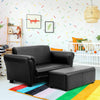Kids double sofa in black with matching ottoman, perfect for playrooms and reading, made from comfortable material.