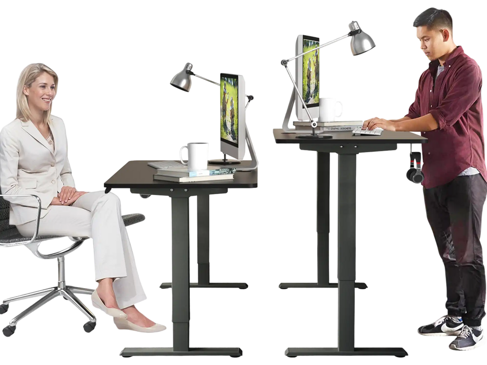 Electric height adjustable standing desk in black with memory controller, shown in both sitting and standing positions.