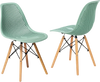 Modern green plastic hollow chair set with wood legs, ergonomic design, perfect for dining rooms or offices.