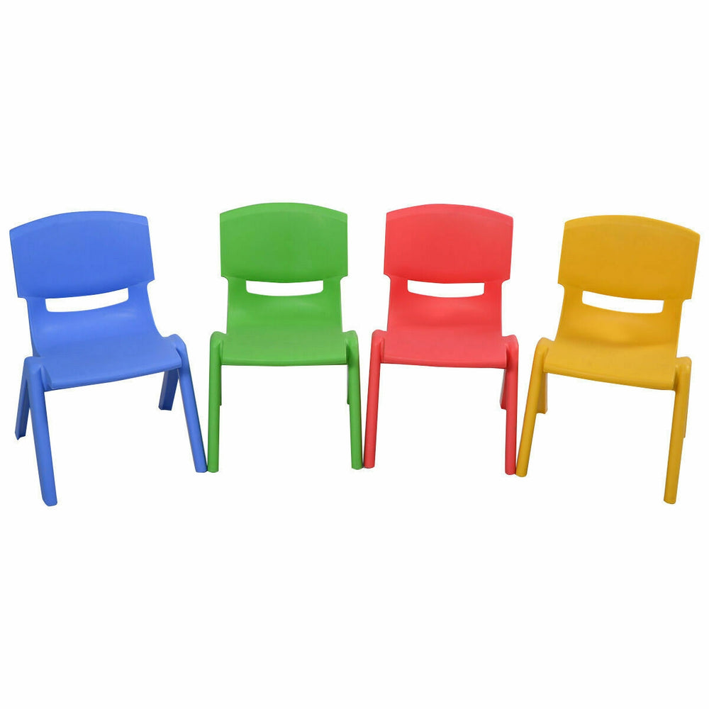 Colorful stackable plastic children chairs in blue, green, red, and yellow, perfect for playroom and daycare use.