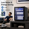 Black 1.55 cu.ft beverage refrigerator with glass door, blue LED lighting, and adjustable shelves in a living room.