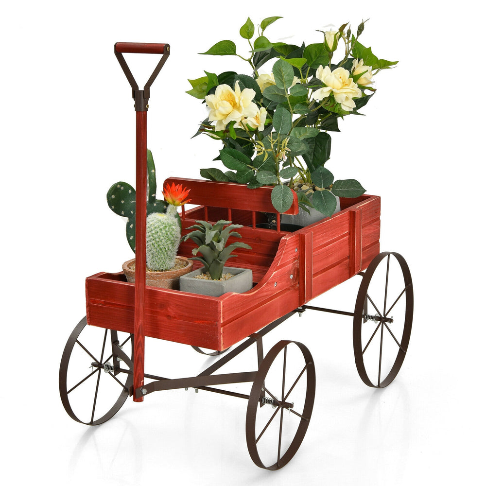 Red wooden wagon plant bed with wheels, featuring two planting sections for flowers and easy mobility in the garden.