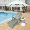 Gray 5-position adjustable folding lounger chaise chair by the poolside, perfect for outdoor relaxation and comfort.