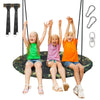 Three children joyfully playing on a 40-inch flying saucer tree swing, made of weather-resistant fabric for outdoor fun.