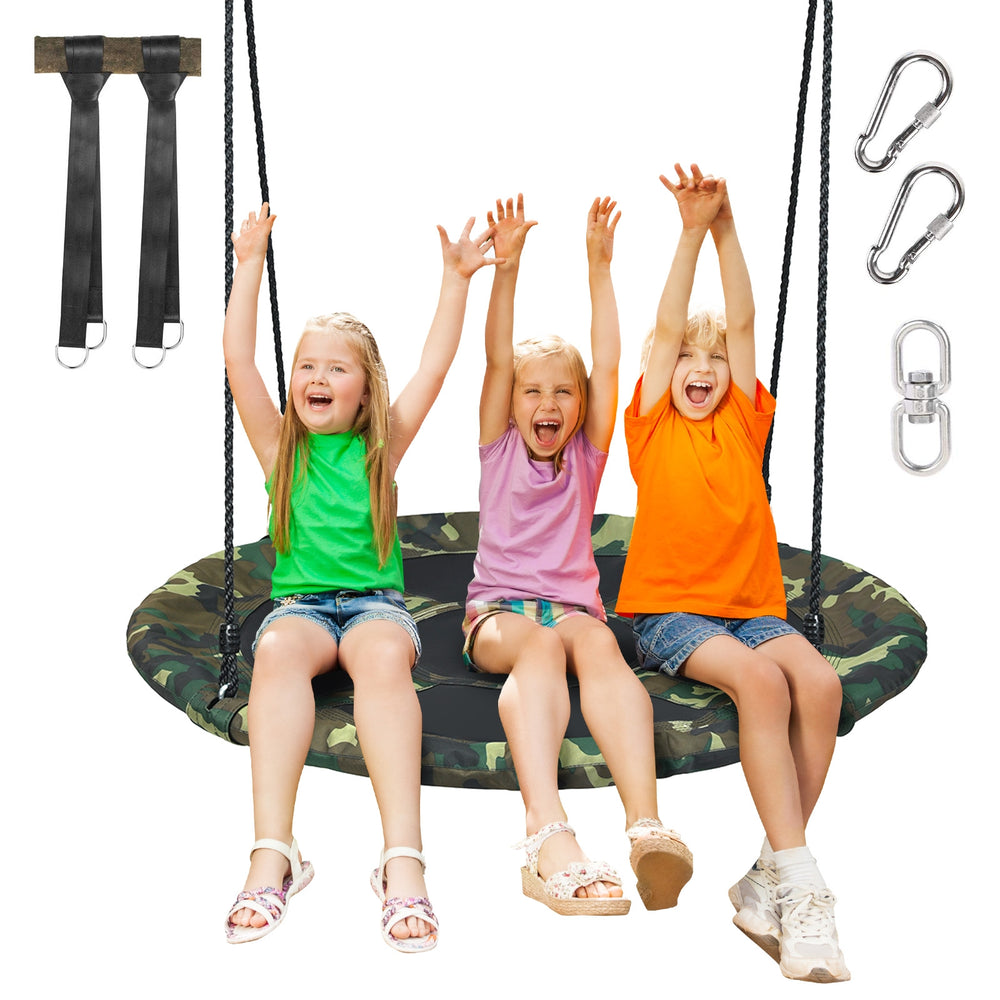 Three children joyfully playing on a 40-inch flying saucer tree swing, made of weather-resistant fabric for outdoor fun.